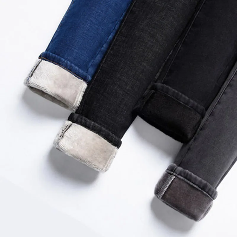 Зимние женские джинсы большого размера утепленные с высокой талией облегающие