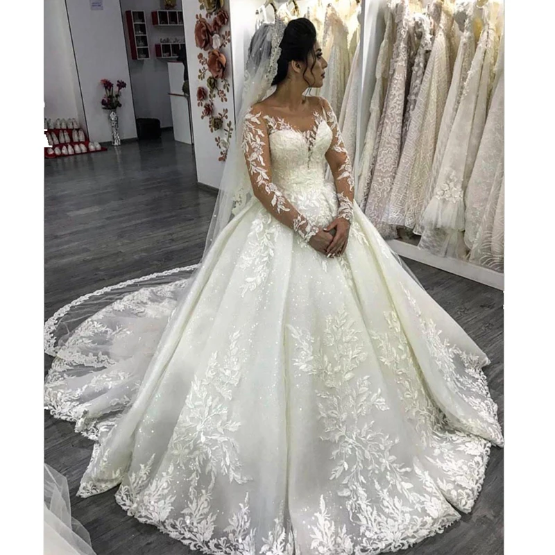 

Modern Long Sleeve Ball Gown Wedding Dresses O Neck Appliques Sequined Church Wedding Gown Tiered Tulle Bridal Dress 2019