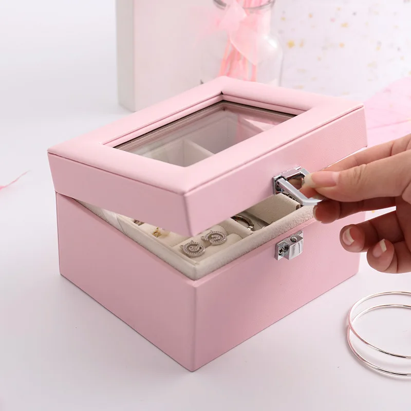 Женский подарок - простая кожаная многофункциональная коробка для хранения украшений с прозрачной крышкой и двумя ярусами.