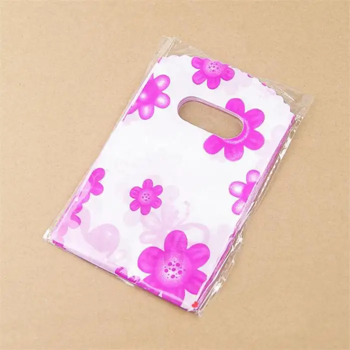 100 шт./лот пластиковые подарочные пакеты с довольно смешанным рисунком конфеты