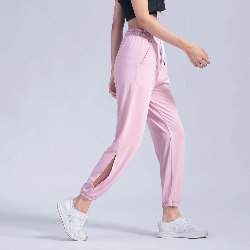Тонкие спортивные штаны женские свободные для йоги тренировок фитнеса стрейч