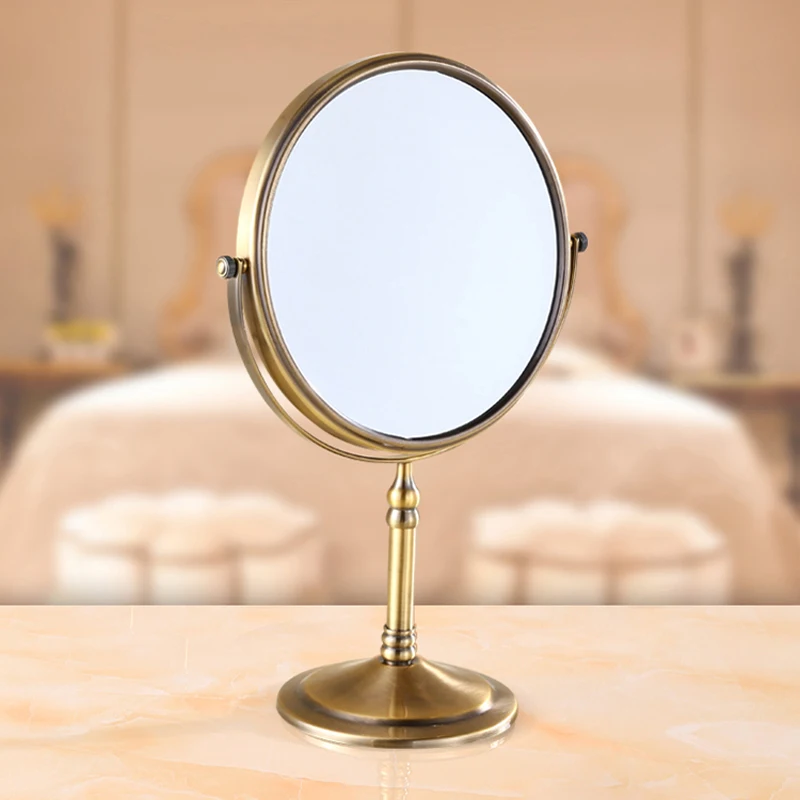 

Polished Copper Framed 8 Inches Round Double-sided Tabletop Cosmetic Swing Mirror With Round Base