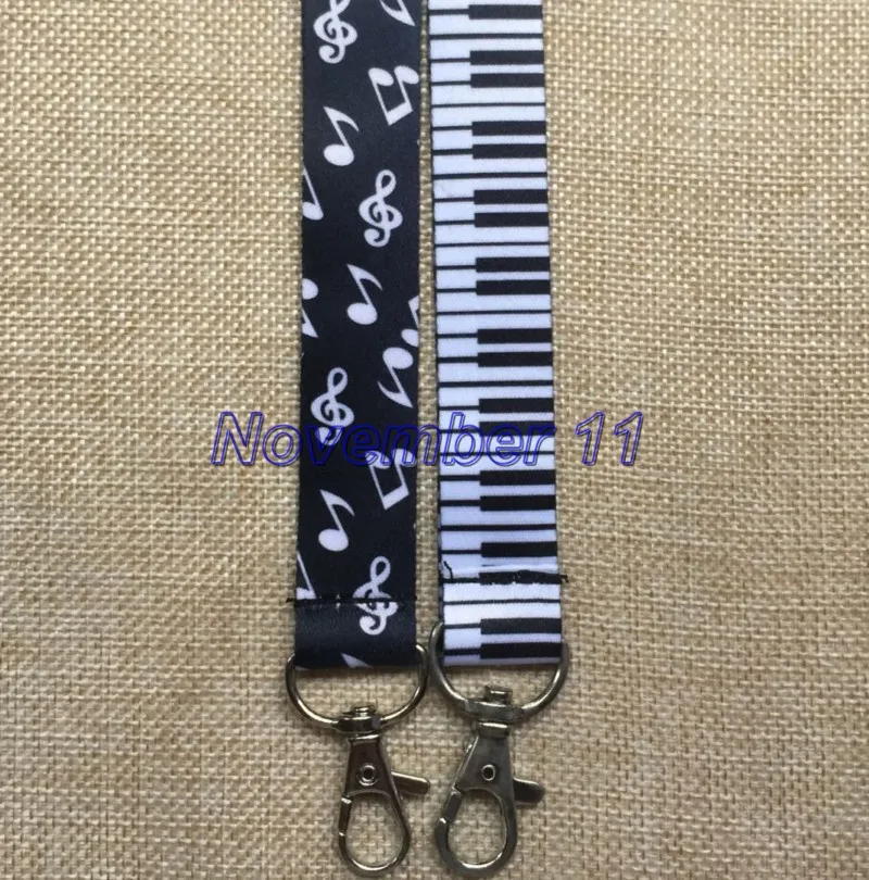 20 шт. смешанный популярный музыкальный пианино мобильный телефон ремешок брелок