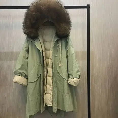light green Большой натуральный мех енота длинный пуховик женский свободный теплый плюс размер пальто с капюшоном зимняя куртка женская белая куртка на утином пуху - Цвет: light green