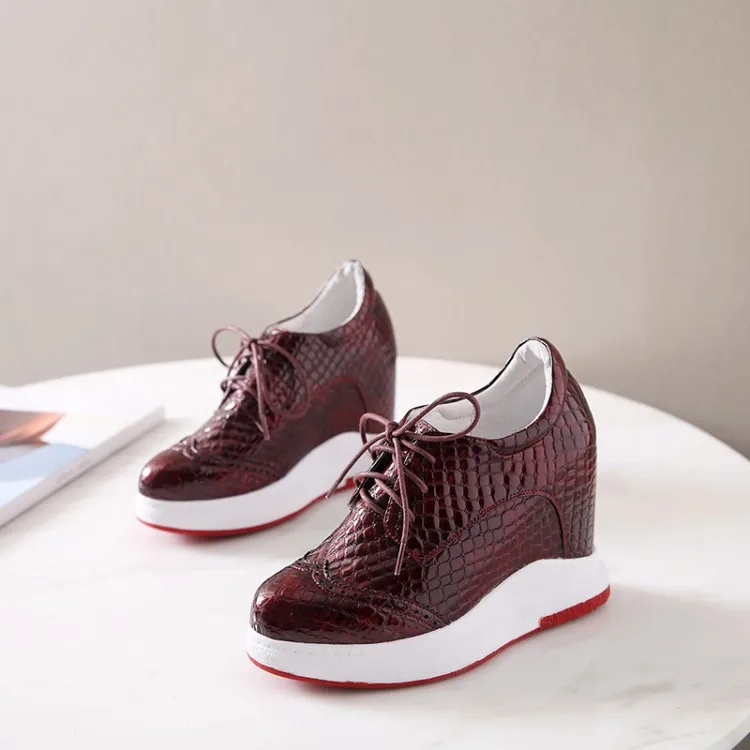 Женские кроссовки из натуральной кожи Зеленые на платформе танкетке 10 см