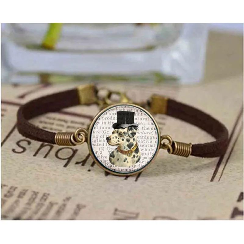 

dalmation with a top hat on a dictionary page background art glass dome dog bracelet