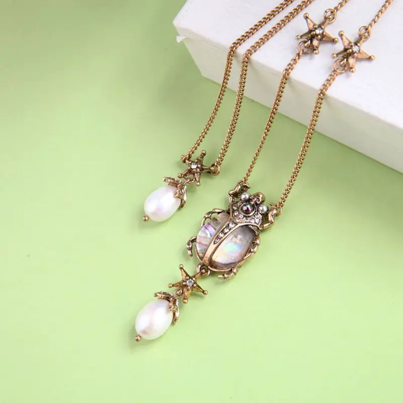 Ожерелье с подвеской в виде жука из натуральной морской ракушки искусственный