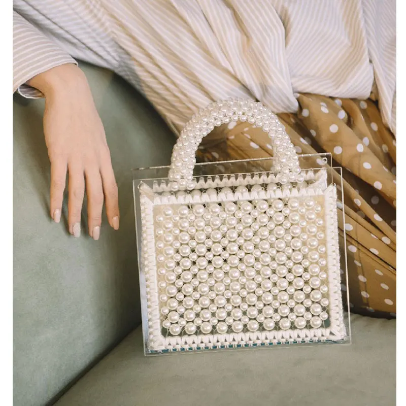 

Pure hand-beaded Pearl Shoutibaoyakeli 2019 new fashion temperament women's single shoulder oblique span knitting bag
