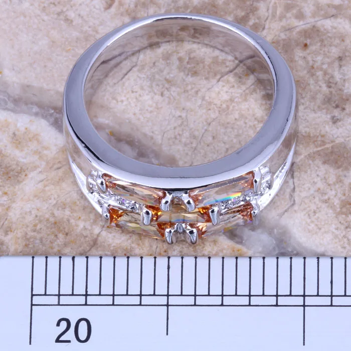 Роскошное женское кольцо из коричневого морганита с белым фианитом и серебряным