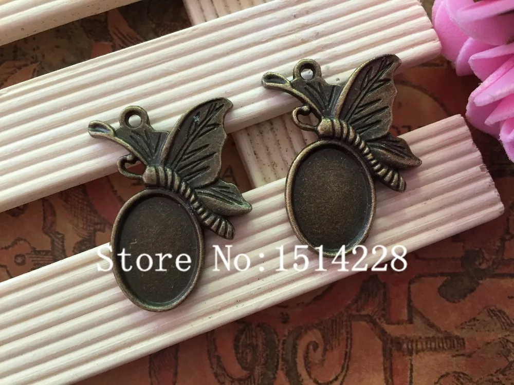 

50pcs/lot. Antiqued Bronze butterfly pattern tray oval Cameo Setting Pendant jewelry charms(inner Size 10*14mm)