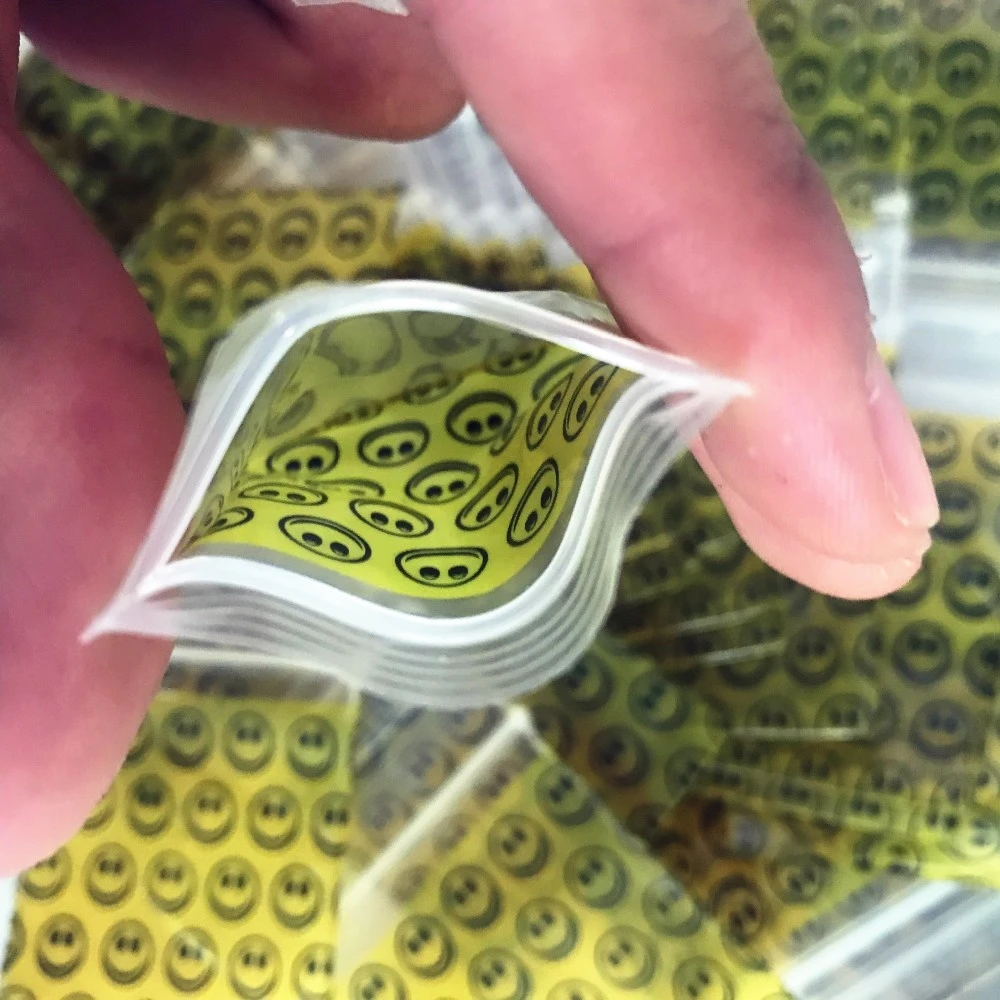 

Multifunction bag 1 pack (100 pieces) hot new tobacco bag tobacco sealed bag storage bag Smile pattern tobacco bag