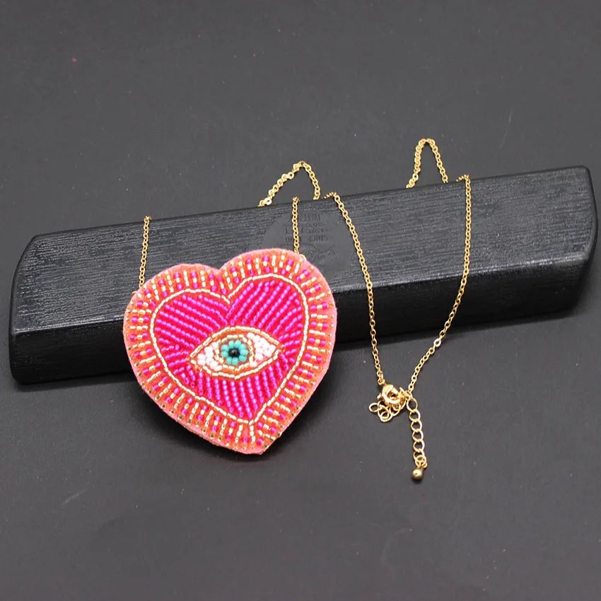 

New Bohemian Rhinestone Rice Beads Heart Eye Necklace Fashion Personality Wild Necklace Fashionable temperament necklace 903