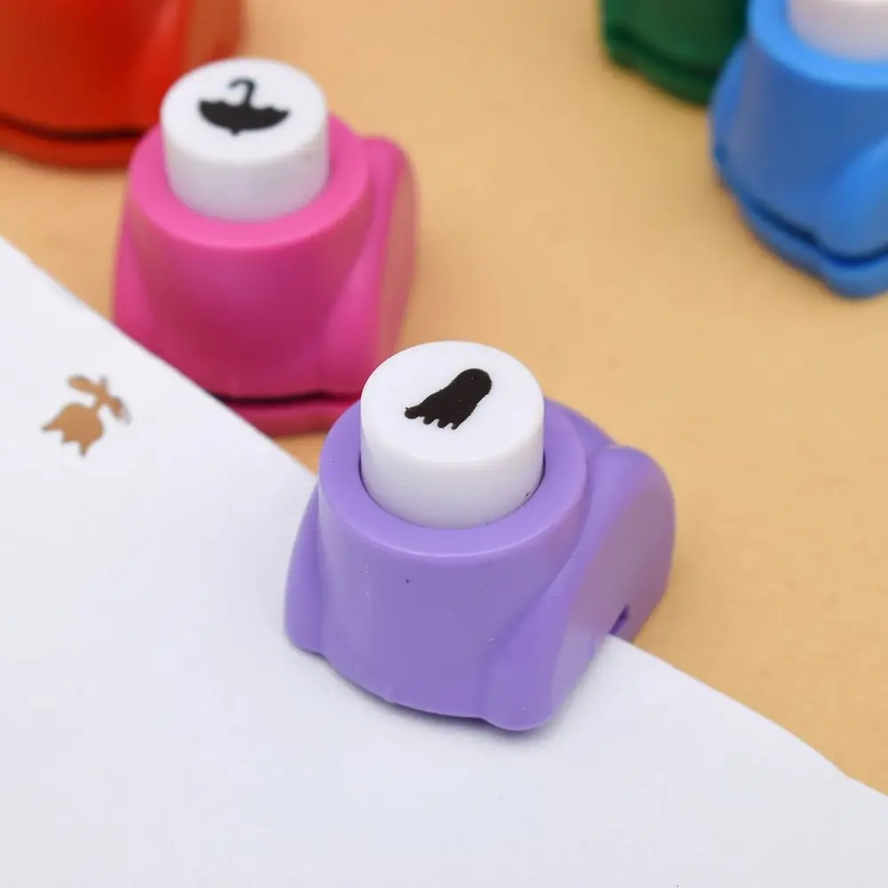 

1 PCS Embossing DIY Paper Punch Cutter Kid Child Mini Printing Hand Shaper Scrapbook Tags Cards Craft Tool Drop Shipping