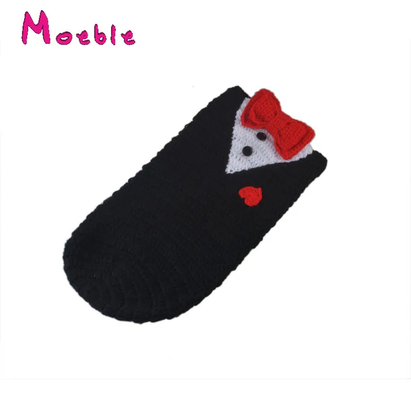 Спальный мешок для новорожденных вязаный кокон с бантом черного цвета спальный