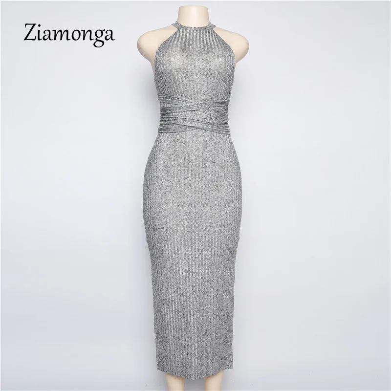 Женское облегающее платье с лямкой вокруг шеи открытой спиной и открытыми