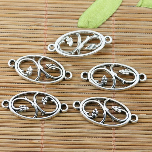 

32pcs tibetan silver color oval shaped floral connector EF2381