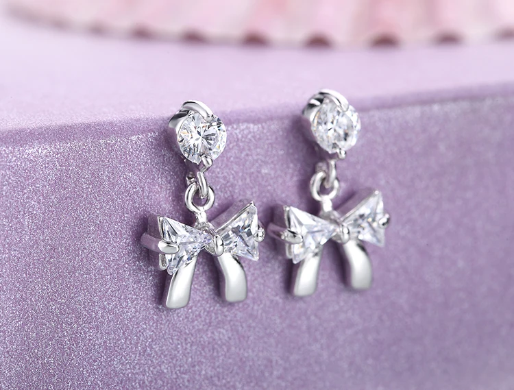 Женские посеребренные серьги-гвоздики с бантом Y | Украшения и аксессуары