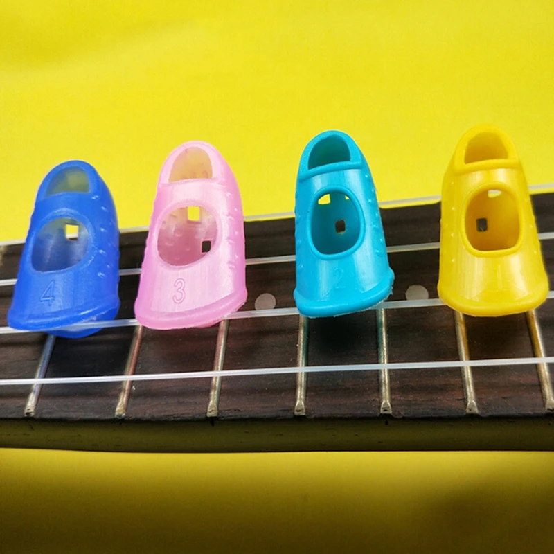 4Pcs/Set For Training Learning Guitar Silicone Finger Guards Fingertip Protectors Ukulele Accessories |