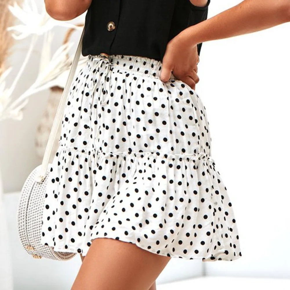 Модная женская юбка с рюшами трапециевидная оборками а-силуэта разрезом