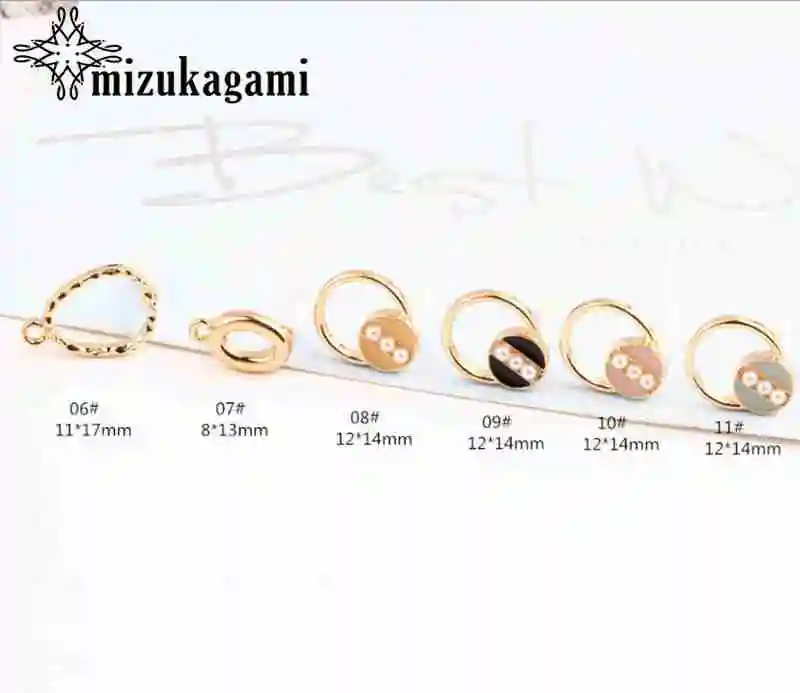 Серьги-подвески с жемчугом коннектор золотыми геометрическими элементами