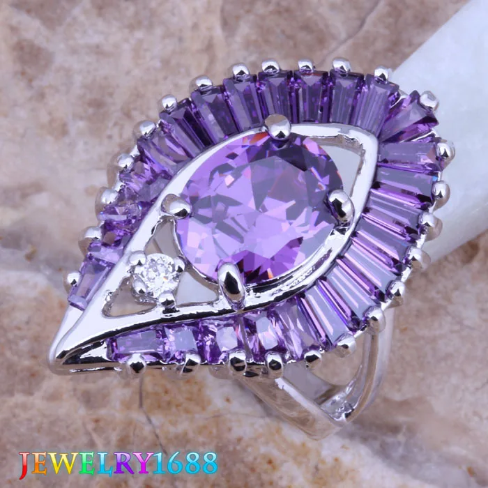 Фантастическое кольцо в форме глаза с фиолетовым кубическим цирконием