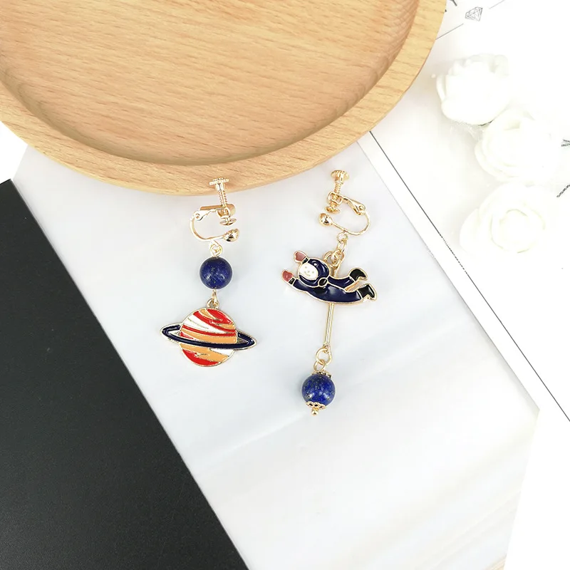 Япония и Южная Корея земля пилоты Астрос планеты асимметричные серьги Галактика