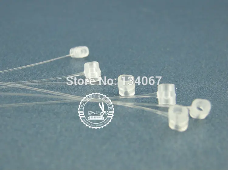 Пластиковая петля с фиксатором замком для крепления бирок на Сумки Одежду