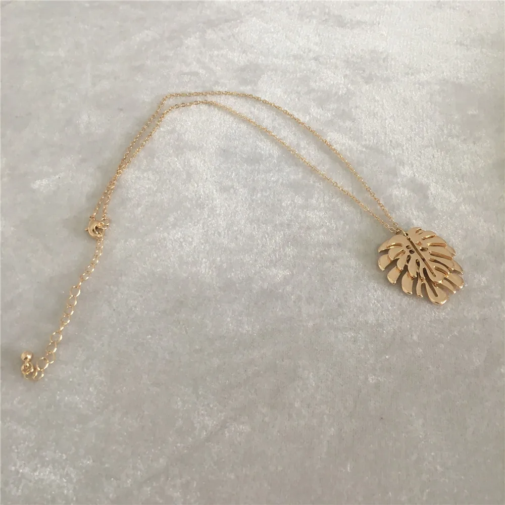 

Trendy gold color two palm tree leaf pendant necklace for woman girl