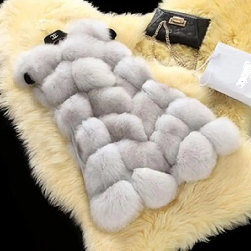 Женский жилет с искусственным мехом зимний теплый из искусственного меха |