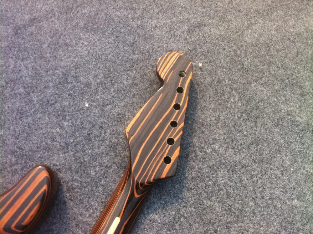 Free shipping one piece Zebrawood body electric guitar kits /unfinished guitar including hardware