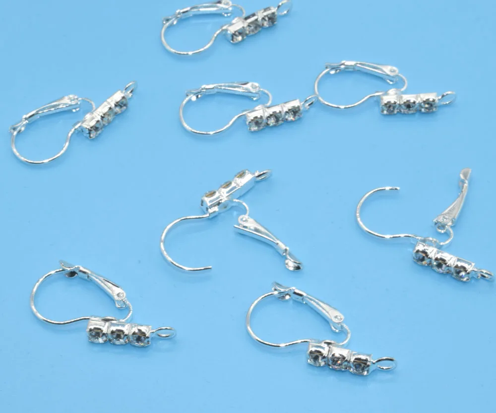 Серьги-клипсы серебристые с 3 кристаллами, 13 х29 мм, 10 шт./партия