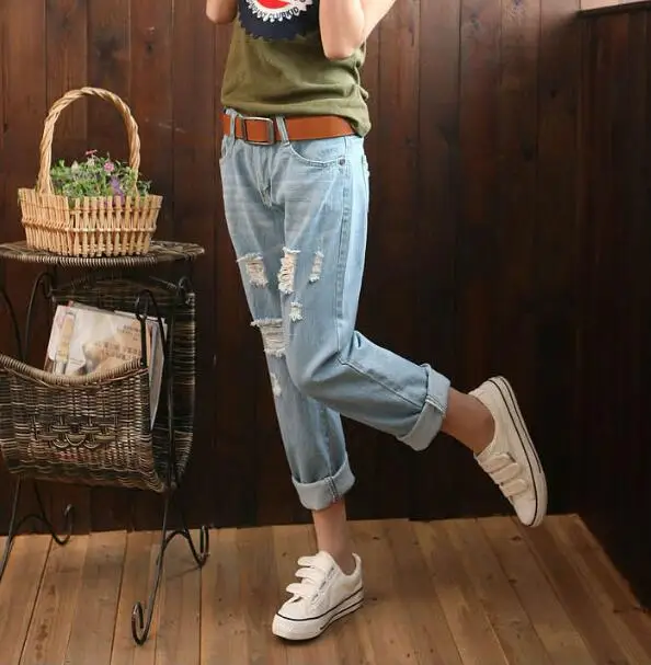 

Summer new women's pants Korean large size loose trousers hole jeans Women's Harlan nine pants autumn winter trend Ripped pants