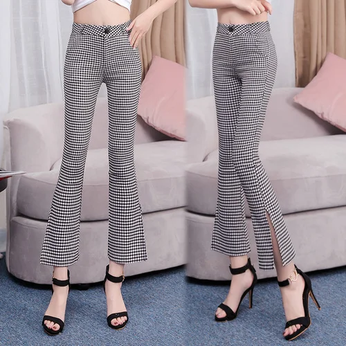 Женские брюки с завышенной талией на молнии карманами расклешенные разрезами по