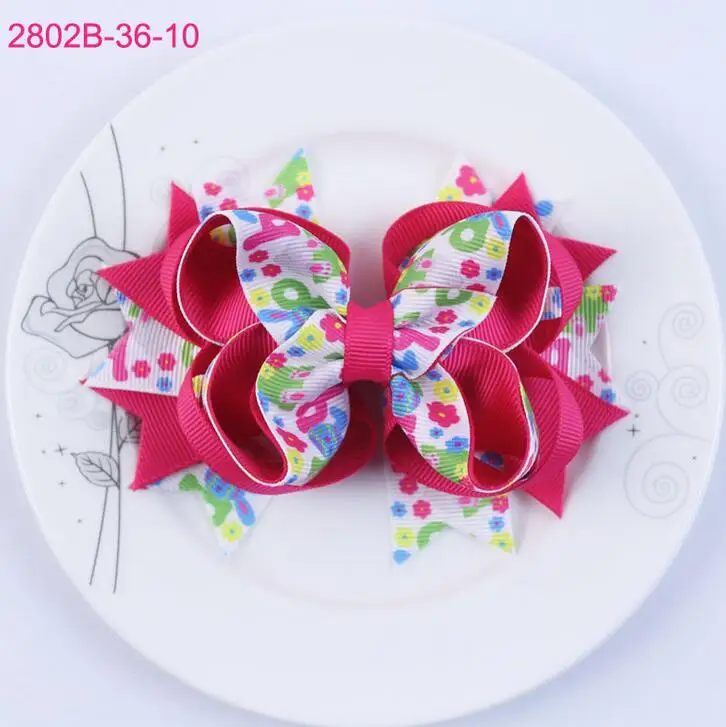 

24pcs Free shipping Spike Hair Bow Bowknot 4" Twisted boutique Hairbow