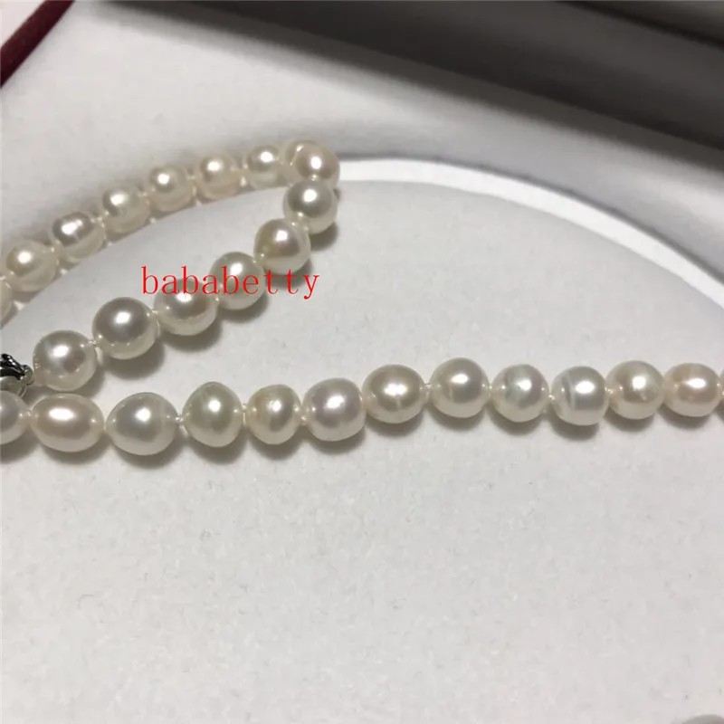 Комплект из колье и серёг с натуральным пресноводным белым жемчугом 7-8 мм 16 х24 |