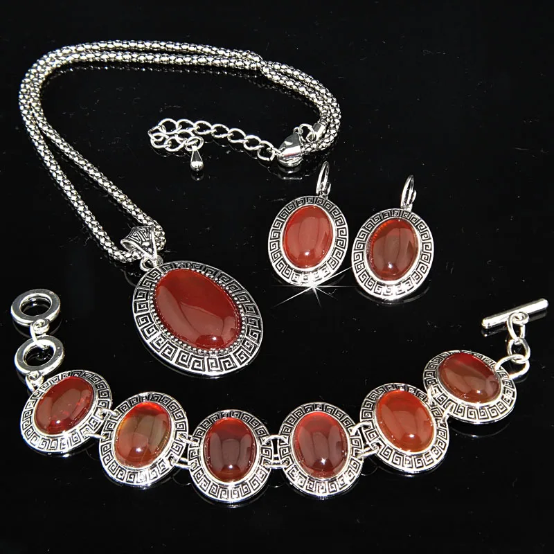 2 комплекта старинное древнее тибетское Серебро овальные серьги с красным камнем