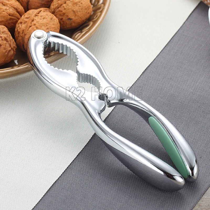 

Quality Magic Nut Cracker Tool Fashion Grips Seafood Cracker Heavy Duty Pecan Walnut Opener Tool Stainless Steel Green or Pink