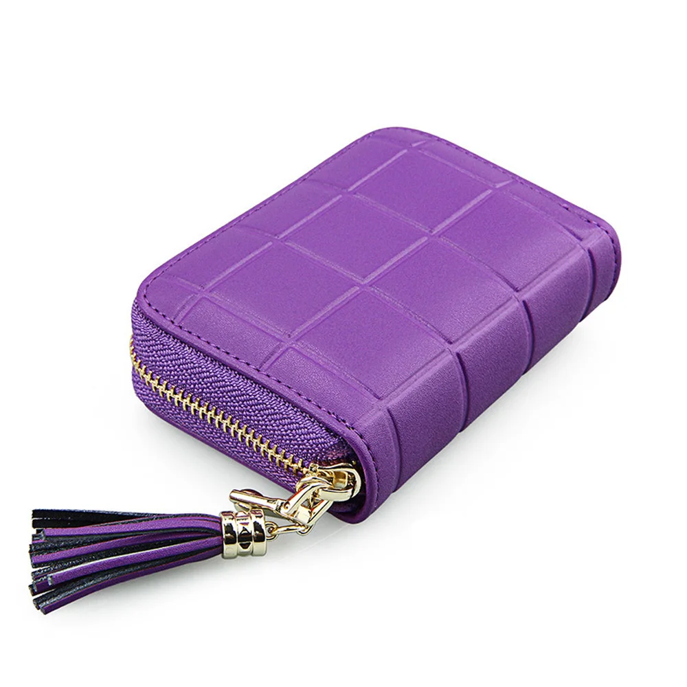 Женский кошелек из натуральной кожи с кисточками и отделением для карт короткий