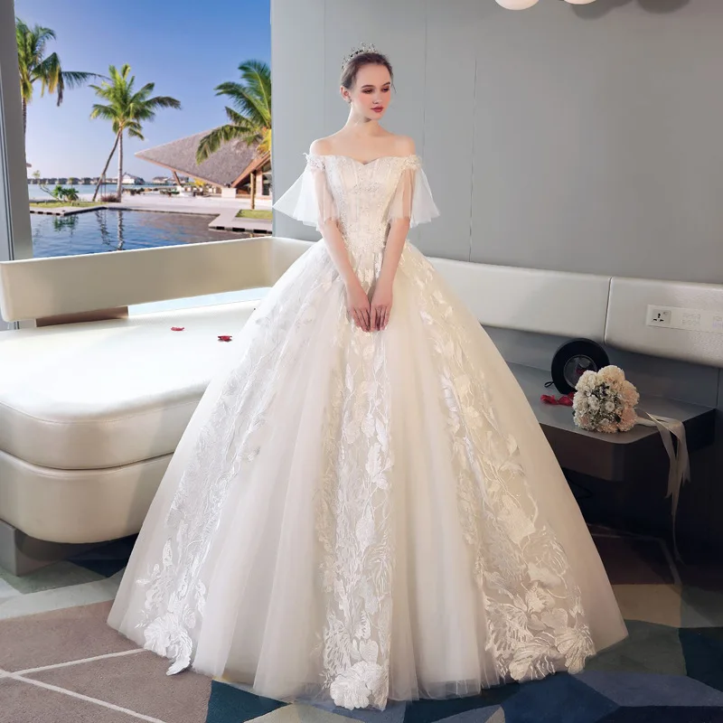 

Real Images New Short Cap Sleeve Bandage Sweetheart Tulle Top Beads Embroidery Lace Luxury Wedding Dress Bridal Gown