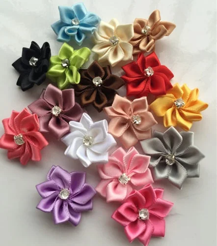 

50pcs Satin Ribbon Flower with Crystal Bead Appliques see the picture.