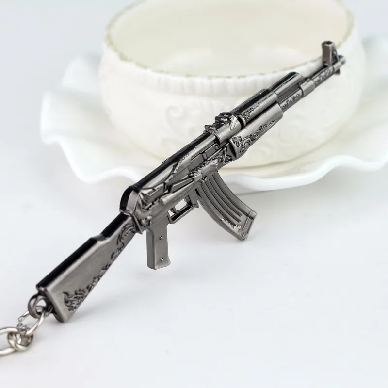 Лидер продаж AK47 серый цвет с красноватым отливом брелок модные CF крест огнестрельное оружие Брелок человек из мультфильма «Время приключений» автомобильный брелок для ключей кольцо ювелирные изделия подарок мужчине