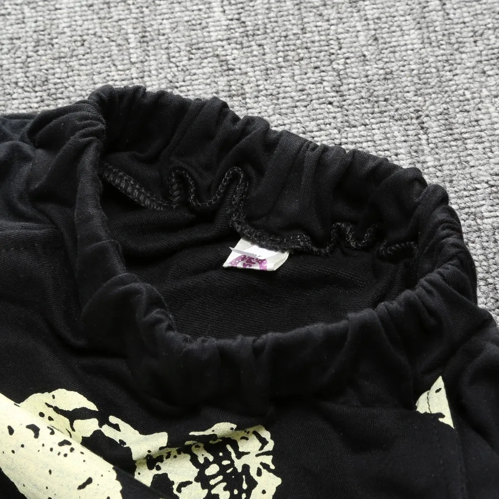 Оригинальные хлопковые детские шаровары для девочек черные с черепом весна