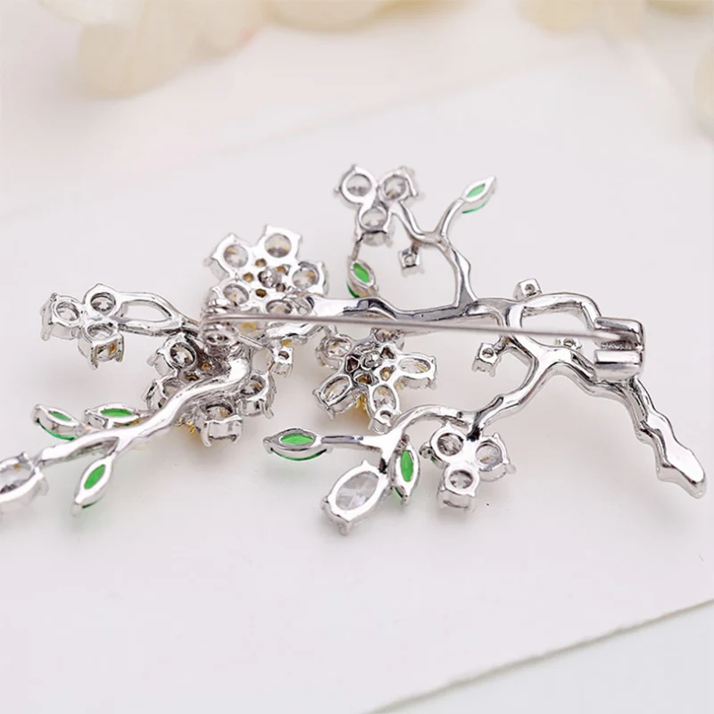 

Donia Jewelry 2018 new brooch copper micro-inlaid AAA zircon hand-painted plum branch brooch ladies fashion brooch scarf pin
