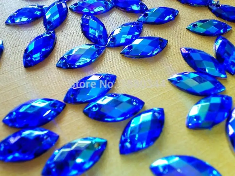 Пришивные камни 7*15 мм в форме пупка с плоской задней поверхностью стразы Dakk