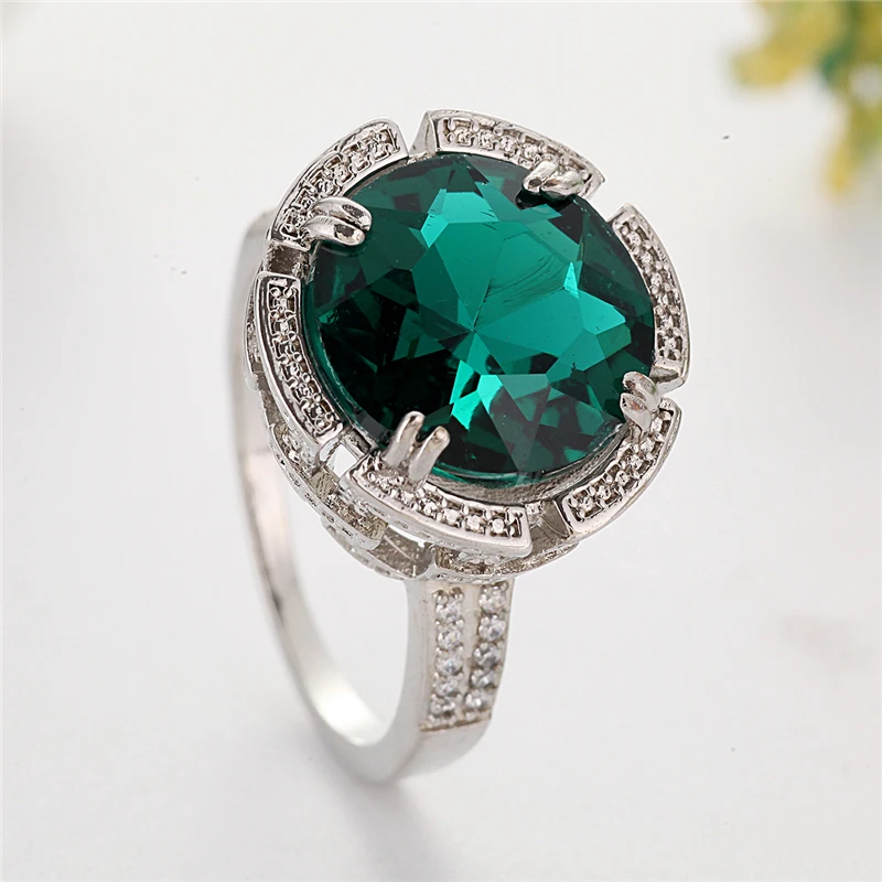Женское большое кольцо с фианитом классическое зеленым камнем обручальное