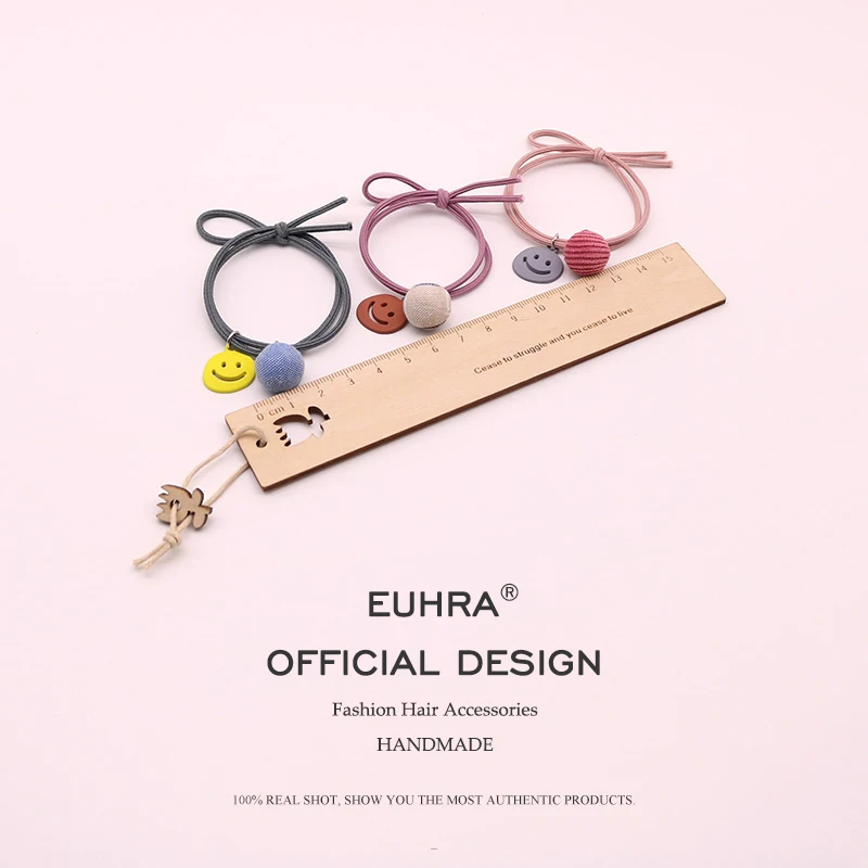 Эластичная полосатая повязка для волос EUHRA с улыбающимся лицом и маленьким