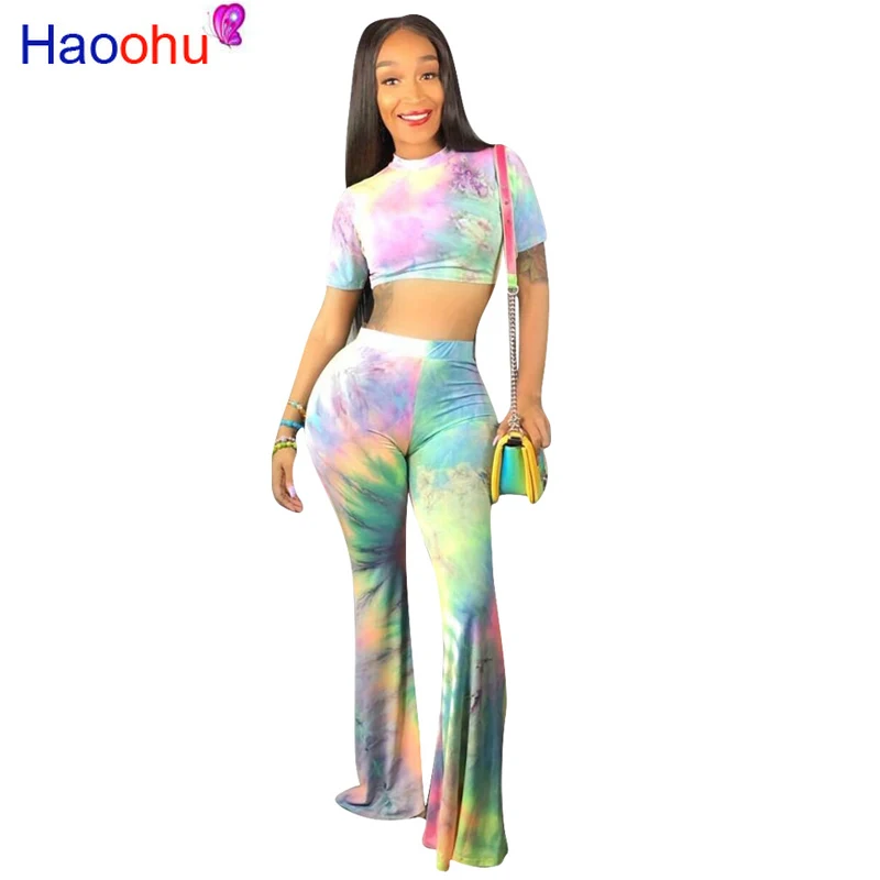 

Colorful Tie Dye Sexy Two Piece Sweat Suits Women Festival Clothing O Neck Short Sleeve Crop Top And Flare Pants 2 Piece Outfit