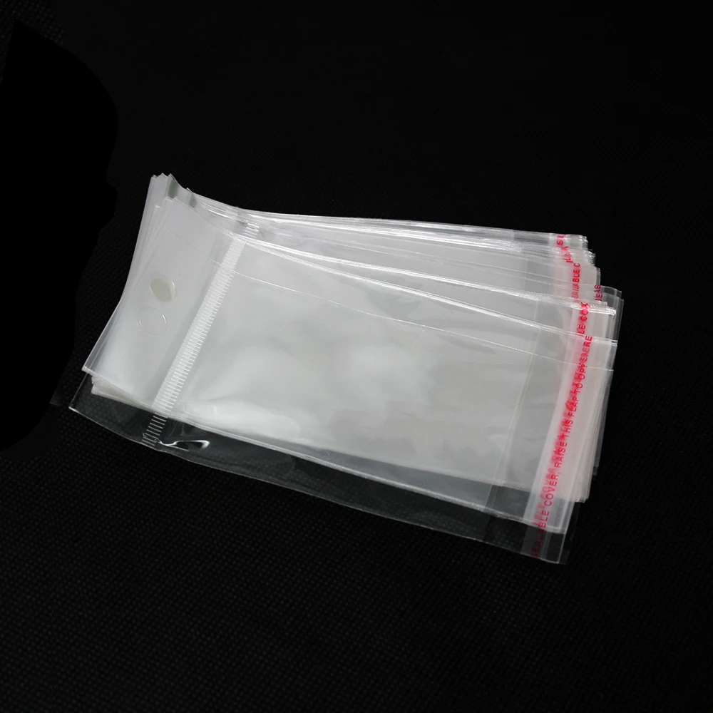 

Free Shipping 100pcs 5*10.5cm Clear Mini Small plastic bags for jewelry Self Adhesive Seal OPP Package bag PDC01-01