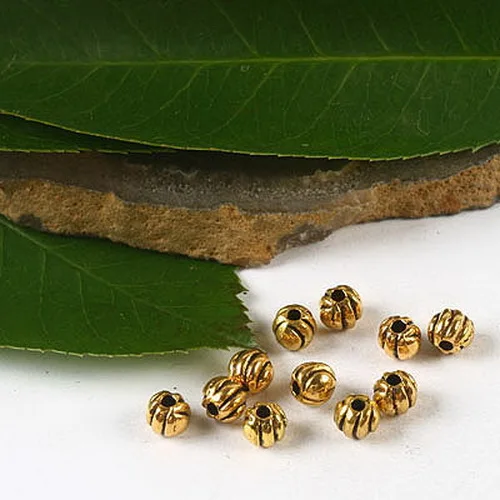 

200pcs dark gold-tone little round spacer beads h2311