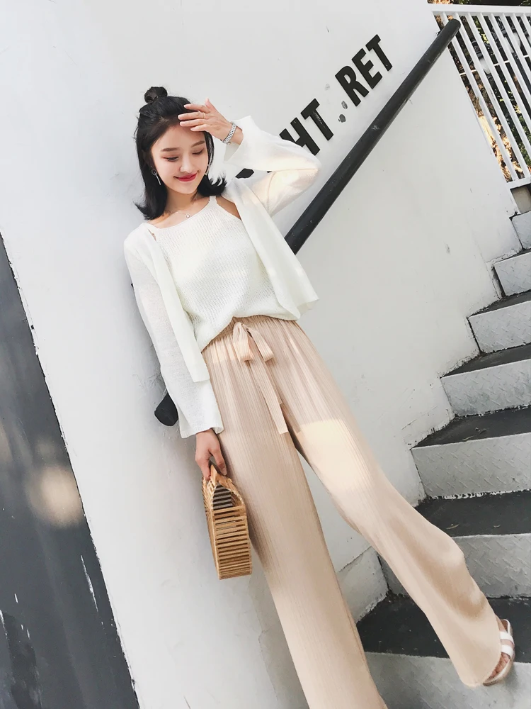 Женские трикотажные брюки из мягкого ледяного шелка широкие драпированные с